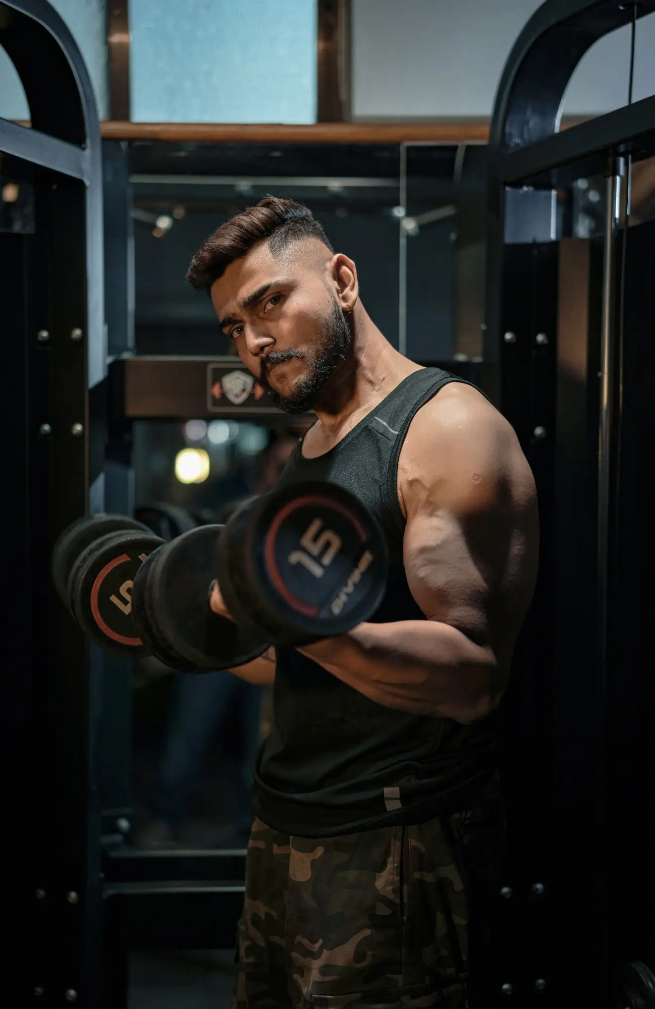 Maddy Bawa training with dumbbells at Bawa Fitness