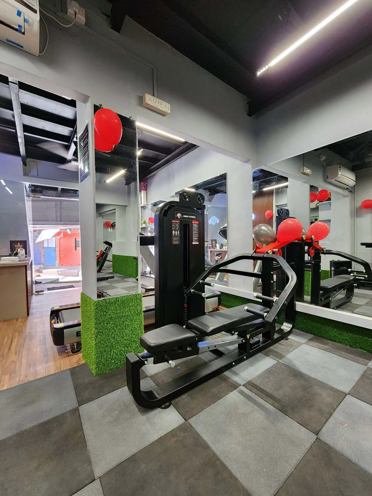 Seated row machine near the reception